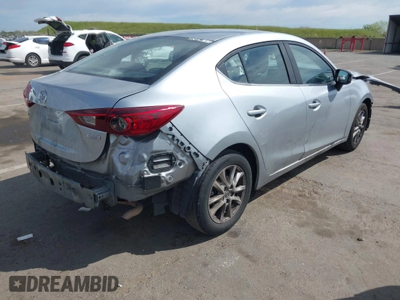 2016 Mazda 3 i Sport with VIN JM1BM1U78G1313957, listed as a IAAI auction lot 42010141 with 161,228 mi miles and . Bid and sale history available at DreamBid. Image 4.