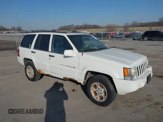1997 Jeep Grand Cherokee Limited with VIN 1J4GZ78Y8VC769675, listed as a IAAI auction lot 41694347 with 113,834 mi miles. Bid and sale history available at carsss.com. Image 1.