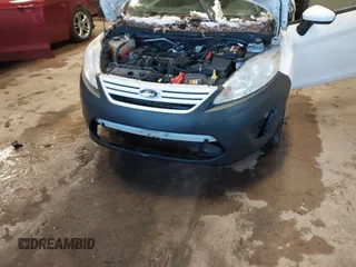 2012 Ford Fiesta S with VIN 3FADP4AJ9CM140647, listed as a IAAI auction lot 41633251 with 117,309 mi miles. Bid and sale history available at carsss.com. Image 6.