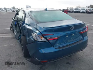 2025 Toyota Camry LE z VIN 4T1DAACK3SU571104, wystawiony jako IAAI lot #42084430 z przebiegiem 1 013 mil mil oraz . Historia ofert i sprzedaży dostępna na DreamBid. Obrazek 3.