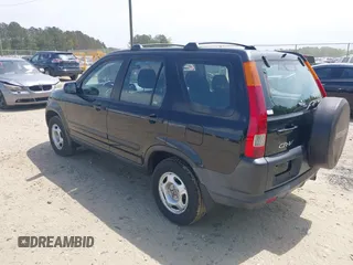 2004 Honda CR-V LX with VIN SHSRD68474U209015, listed as a IAAI auction lot 42040424 with 100,923 mi miles and . Bid and sale history available at carsss.com. Image 3.