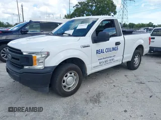 2018 Ford F-150 XL with VIN 1FTMF1CB0JFE21234, listed as a IAAI auction lot 42605399 with 243,035 mi miles and . Bid and sale history available at DreamBid. Image 2.