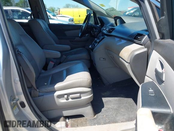 2012 Honda Odyssey Touring with VIN 5FNRL5H96CB043939, listed as a IAAI auction lot 41983643 with 202,535 mi miles. Bid and sale history available at carsss.com. Image 5.