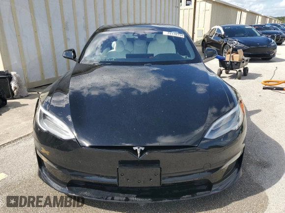 2022 Tesla Model S Plaid z VIN 5YJSA1E64NF461218, wystawiony jako Copart lot #74178794 z przebiegiem Nie podano mil oraz Szkoda całkowita • Salvage title. Historia ofert i sprzedaży dostępna na DreamBid. Obrazek 5.