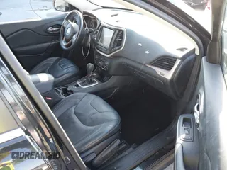 2014 Jeep Cherokee Limited with VIN 1C4PJMDB9EW210180, listed as a IAAI auction lot 41302037 with 75,177 mi miles and . Bid and sale history available at DreamBid. Image 5.