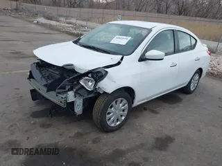 2016 Nissan Versa S with VIN 3N1CN7APXGL808164, listed as a IAAI auction lot 41815979 with 169,000 mi miles. Bid and sale history available at carsss.com. Image 2.