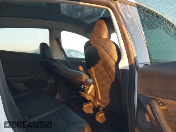 2023 Tesla Model Y Long Range z VIN 7SAYGDEE6PA061228, wystawiony jako IAAI lot #41371547 z przebiegiem 25 121 mil mil oraz . Historia ofert i sprzedaży dostępna na DreamBid. Obrazek 8.