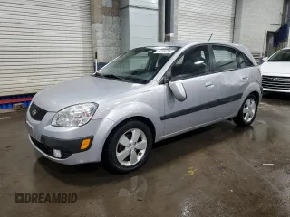 2009 Kia Rio LX with VIN KNADE243196496923, listed as a Copart auction lot 44235725 with 103,171 mi miles and Salvage Title. Bid and sale history available at carsss.com. Image 1.