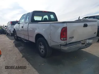 2002 Ford F-150 XL with VIN 1FTRX17262NB99755, listed as a IAAI auction lot 41181246 with 1 mi miles. Bid and sale history available at carsss.com. Image 3.