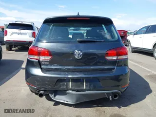 2012 Volkswagen GTI with VIN WVWHV7AJ6CW178615, listed as a IAAI auction lot 41975014 with 60,698 mi miles. Bid and sale history available at carsss.com. Image 16.
