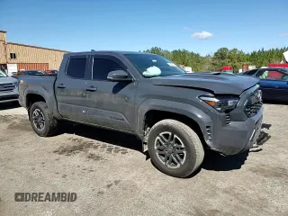2024 Toyota Tacoma SR5 z VIN 3TMLB5JN2RM017259, wystawiony jako Copart lot #47946465 z przebiegiem 29 596 mil mil oraz Szkoda całkowita • Salvage title. Historia ofert i sprzedaży dostępna na DreamBid. Obrazek 11.