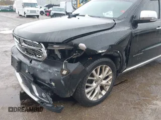 2014 Dodge Durango Citadel with VIN 1C4RDJEG5EC466164, listed as a IAAI auction lot 40936279 with 259,102 mi miles and . Bid and sale history available at DreamBid. Image 6.