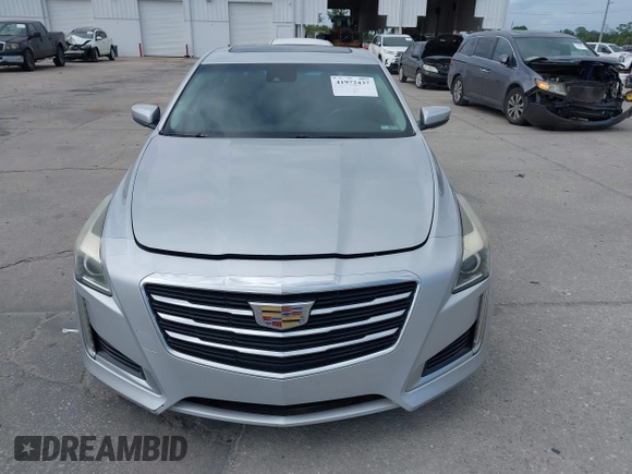 2016 Cadillac CTS with VIN 1G6AR5SS9G0194126, listed as a IAAI auction lot 41972437 with 129,742 mi miles and . Bid and sale history available at DreamBid. Image 12.