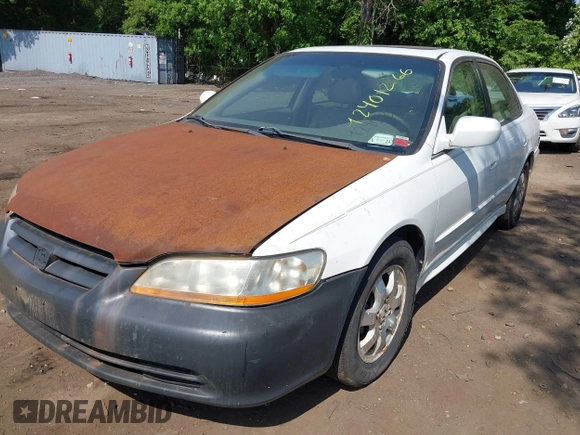 2001 Honda Accord EX z VIN 1HGCG56611A124406, wystawiony jako IAAI lot #42401266 z przebiegiem 177 917 mil mil oraz . Historia ofert i sprzedaży dostępna na DreamBid. Obrazek 2.
