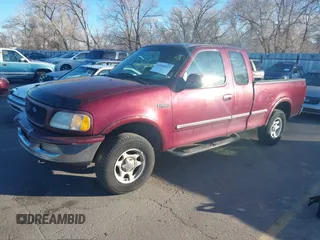 1997 Ford F-150 XL with VIN 1FTDX1869VKA51231, listed as a IAAI auction lot 41846817 with 297,327 mi miles. Bid and sale history available at carsss.com. Image 2.