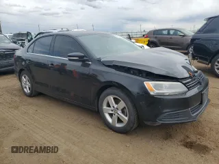 2014 Volkswagen Jetta TDI w/Premium with VIN 3VW3L7AJ9EM438697, listed as a Copart auction lot 57641645 with 191,231 mi miles and Salvage title. Bid and sale history available at DreamBid. Image 4.