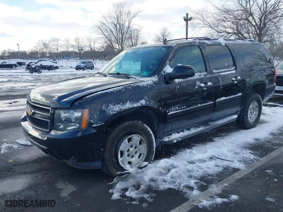 2014 Chevrolet Suburban LT with VIN 1GNSKJE79ER112014, listed as a IAAI auction lot 41384706 with 257,484 mi miles. Bid and sale history available at carsss.com. Image 2.