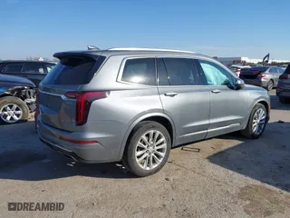 2020 Cadillac XT6 FWD Premium Luxury with VIN 1GYKPCRS8LZ129799, listed as a IAAI auction lot 41602536 with 96,865 mi miles. Bid and sale history available at carsss.com. Image 4.