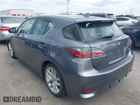 2014 Lexus CT 200h with VIN JTHKD5BH0E2182533, listed as a IAAI auction lot 42103643 with 139,236 mi miles and . Bid and sale history available at DreamBid. Image 3.