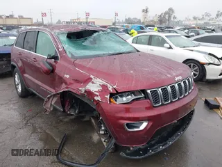 2021 Jeep Grand Cherokee Laredo X with VIN 1C4RJEAG4MC681989, listed as a IAAI auction lot 41571341 with 61,090 mi miles and . Bid and sale history available at DreamBid. Image 6.
