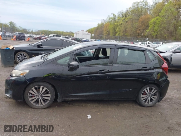 2015 Honda Fit EX-L with VIN 3HGGK5H88FM726406, listed as a IAAI auction lot 42033501 with 124,216 mi miles. Bid and sale history available at carsss.com. Image 14.