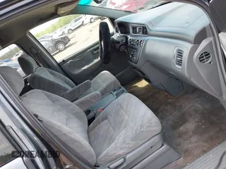 2004 Honda Odyssey EX-RES z VIN 5FNRL18824B138287, wystawiony jako IAAI lot #42245444 z przebiegiem 196 932 mil mil oraz . Historia ofert i sprzedaży dostępna na DreamBid. Obrazek 5.