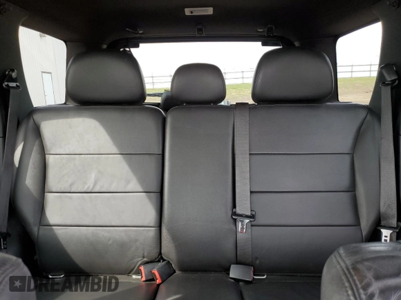 2010 Ford Escape Limited z VIN 1FMCU9E7XAKB63865, wystawiony jako Copart lot #51208285 z przebiegiem 177 517 mil mil oraz Czysty tytuł • Clean title. Historia ofert i sprzedaży dostępna na DreamBid. Obrazek 10.