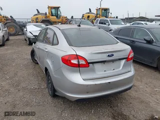 2013 Ford Fiesta SE with VIN 3FADP4BJXDM220183, listed as a IAAI auction lot 42026592 with 153,396 mi miles. Bid and sale history available at carsss.com. Image 3.