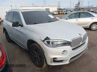 2014 BMW X5 xDrive50i z VIN 5UXKR6C56E0C03380, wystawiony jako IAAI lot #41364233 z przebiegiem 85 422 mil mil oraz . Historia ofert i sprzedaży dostępna na DreamBid. Obrazek 1.