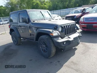 2024 Jeep Wrangler Sport S with VIN 1C4PJXAN9RW117133, listed as a IAAI auction lot 42497915 with 9,754 mi miles and . Bid and sale history available at DreamBid. Image 1.