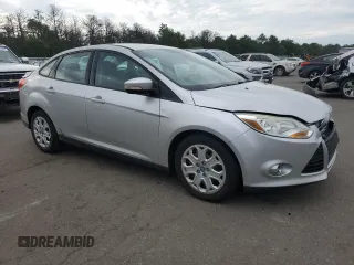 2012 Ford Focus SE with VIN 1FAHP3F2XCL202510, listed as a Copart auction lot 64066545 with 77,828 mi miles and Salvage title. Bid and sale history available at DreamBid. Image 4.