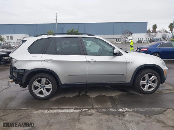 2007 BMW X5 3.0si with VIN 5UXFE43597L017476, listed as a IAAI auction lot 41459147 with 184,494 mi miles. Bid and sale history available at carsss.com. Image 14.