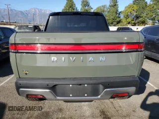 2022 Rivian R1T Launch Edition z VIN 7FCTGAAL3NN003101, wystawiony jako Copart lot #85602634 z przebiegiem 17 189 mil mil oraz Szkoda całkowita • Salvage title. Historia ofert i sprzedaży dostępna na DreamBid. Obrazek 6.