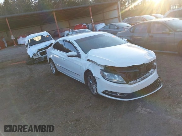 2014 Volkswagen CC R-Line with VIN WVWBP7AN0EE521995, listed as a IAAI auction lot 41213732 with 113,421 mi miles. Bid and sale history available at carsss.com. Image 1.