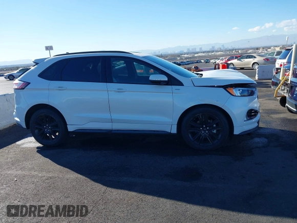 2020 Ford Edge SEL z VIN 2FMPK3J92LBB53467, wystawiony jako IAAI lot #41241115 z przebiegiem 58 183 mil mil oraz . Historia ofert i sprzedaży dostępna na DreamBid. Obrazek 13.