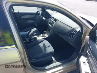 2010 Chrysler Sebring Touring z VIN 1C3CC4FBXAN144734, wystawiony jako IAAI lot #42548485 z przebiegiem 160 588 mil mil oraz . Historia ofert i sprzedaży dostępna na DreamBid. Obrazek 5.
