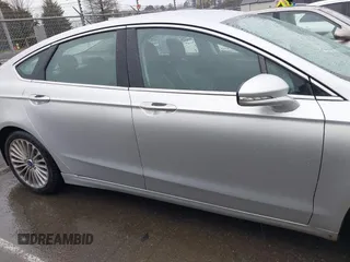 2016 Ford Fusion Titanium with VIN 3FA6P0K91GR360914, listed as a IAAI auction lot 41833665 with 107,367 mi miles and . Bid and sale history available at DreamBid. Image 13.