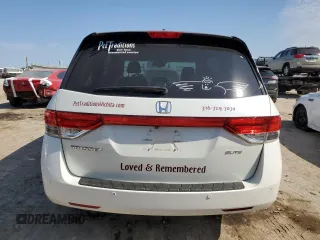 2014 Honda Odyssey Touring z VIN 5FNRL5H92EB059168, wystawiony jako Copart lot #76121914 z przebiegiem 264 715 mil mil oraz Szkoda całkowita • Salvage title. Historia ofert i sprzedaży dostępna na DreamBid. Obrazek 6.