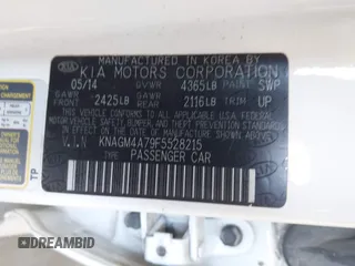 2015 Kia Optima LX z VIN KNAGM4A79F5528215, wystawiony jako IAAI lot #42317163 z przebiegiem 215 395 mil mil oraz . Historia ofert i sprzedaży dostępna na DreamBid. Obrazek 9.