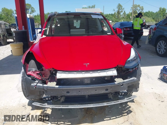 2020 Tesla Model Y Long Range with VIN 5YJYGDEE0LF029496, listed as a IAAI auction lot 41977695 with 47,958 mi miles and . Bid and sale history available at DreamBid. Image 11.