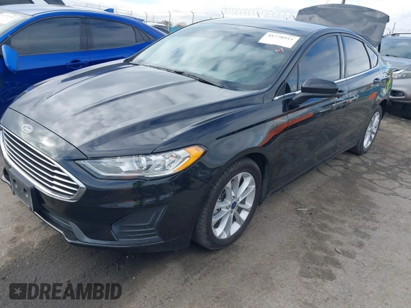 2020 Ford Fusion Hybrid SE with VIN 3FA6P0LU3LR113987, listed as a IAAI auction lot 41778511 with 67,509 mi miles. Bid and sale history available at carsss.com. Image 2.