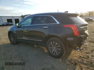 2017 Cadillac XT5 Luxury AWD z VIN 1GYKNDRS2HZ122057, wystawiony jako Copart lot #41686825 z przebiegiem 136 844 mil mil oraz Szkody całkowita. Historia ofert i sprzedaży dostępna na DreamBid. Obrazek 2.