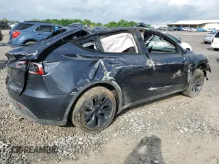 2024 Tesla Model Y Long Range z VIN 7SAYGDEEXRA324517, wystawiony jako Copart lot #55274615 z przebiegiem Nie podano mil oraz Szkoda całkowita • Salvage title. Historia ofert i sprzedaży dostępna na DreamBid. Obrazek 3.