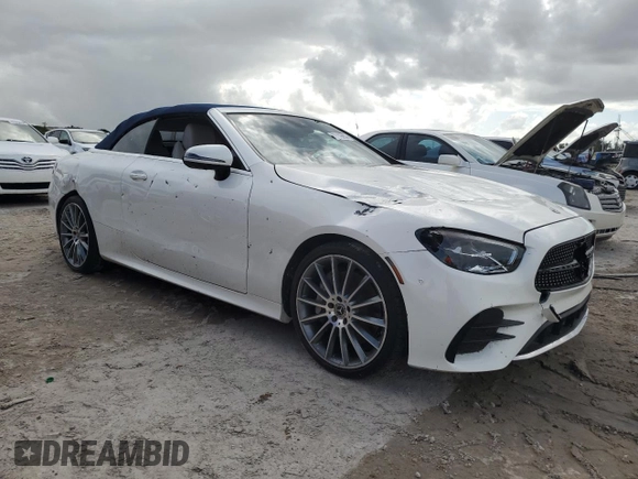 2021 Mercedes-Benz E 450 with VIN W1K1K5JB8MF157053, listed as a Copart auction lot 77119904 with 14,081 mi miles and Salvage title. Bid and sale history available at DreamBid. Image 4.