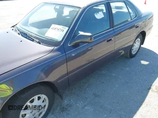 1996 Toyota Camry DX with VIN 4T1BG12K8TU915891, listed as a IAAI auction lot 41874731 with 57,564 mi miles. Bid and sale history available at carsss.com. Image 6.