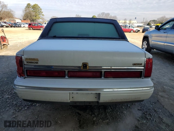 1997 Lincoln Town Car Signature z VIN 1LNLM82W9VY633666, wystawiony jako Copart lot #45396215 z przebiegiem 100 182 mil mil oraz Szkoda całkowita • Salvage title. Historia ofert i sprzedaży dostępna na DreamBid. Obrazek 6.