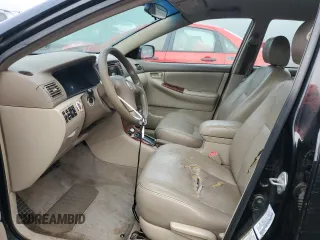 2005 Toyota Corolla CE with VIN 1NXBR30E75Z463700, listed as a Copart auction lot 84317814 with 210,910 mi miles and Clean Title. Bid and sale history available at DreamBid. Image 7.
