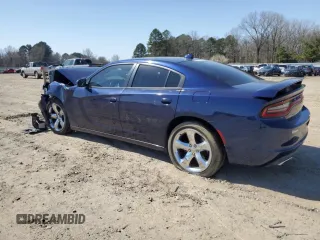 2015 Dodge Charger SXT with VIN 2C3CDXHG5FH744794, listed as a Copart auction lot 48576845 with 139,940 mi miles and Salvage Title. Bid and sale history available at DreamBid. Image 2.
