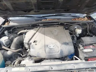 2014 Toyota Tacoma with VIN 3TMLU4EN0EM148389, listed as a IAAI auction lot 41490721 with 119,731 mi miles. Bid and sale history available at carsss.com. Image 10.