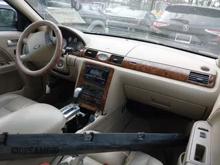 2005 Ford Five Hundred Limited with VIN 1FAFP25155G129701, listed as a IAAI auction lot 41402097 with 86,264 mi miles. Bid and sale history available at carsss.com. Image 5.